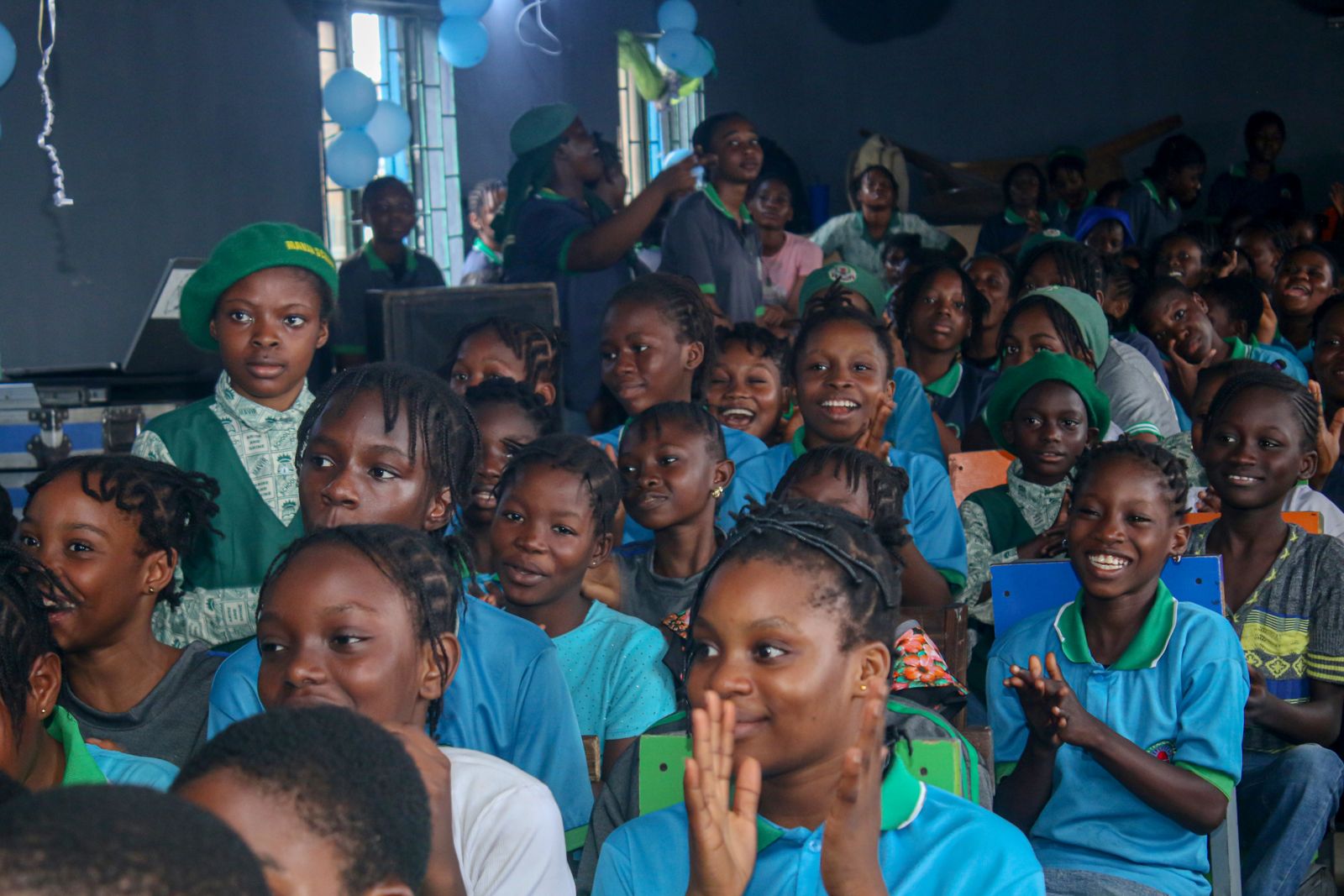 Smiling girls clapping at the GLYE International Day of the Girl celebration at Mavir Leaders College, October 2026
